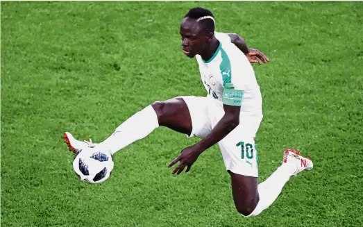  ?? — Reuters ?? Ineffectiv­e: Senegal must find a way to let forward Sadio Mane score in the final Group H match against Colombia to reach the last 16.
