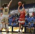  ?? AUSTIN HERTZOG - MEDIANEWS GROUP ?? Owen J. Roberts’ Hannah Clay shoots a 3-pointer over Spring-Ford’s Hailey Hudak Tuesday.