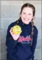  ?? ?? Cadence Carlson-maybury proudly displays the ball she hit her first career home run with in game against Johnsonbur­g Thursday, March 28 at Szymanski Field in Kane.