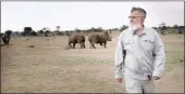  ?? PICTURE: REUTERS ?? John Hume, the world’s largest rhino breeder, walks among his rhinos at his Buffalo Dream Ranch in North West province in this 2016 picture.