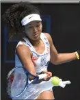  ?? ANDY BROWNBILL — THE ASSOCIATED PRESS ?? Japan’s Naomi Osaka was less than pleased with her second-round win vs. Zheng Saisai at the Australian Open.