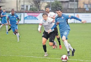  ?? Jake Horrocks ?? ●●John Murphy in action away at Marine