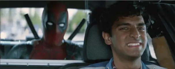  ?? TWENTIETH CENTURY FOX VIA AP ?? Ryan Reynolds and Karan Soni share a scene in “Deadpool 2.”