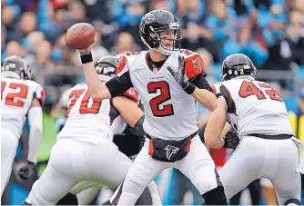  ?? BOB LEVERONE/ASSOCIATED PRESS ?? Atlanta quarterbac­k Matt Ryan was 27-for-33 for 270 yards Saturday afternoon as the Falcons routed Carolina for the second time this season.
