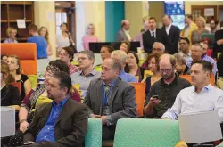  ??  ?? Attendees at a “1 Million Cups” event in 2015 at FatPipe ABQ. The weekly entreprene­urial meet-up, which continued online during the pandemic, will resume in-person this month.