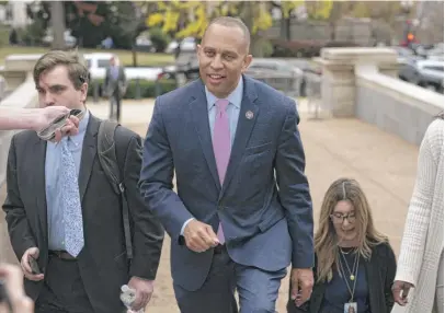  ?? JOSE LUIS MAGANA/AP ?? U.S. Rep. Hakeem Jeffries, D-N.Y., walks to the Capitol on Wednesday after being elected Democratic leader.