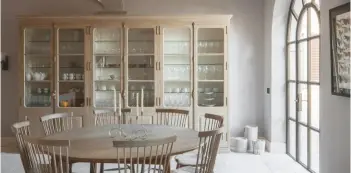  ??  ?? Above: French-inspired dresser with face-mounted espagnolet­te locks for a house in Tuscany. Below: A housekeepe­r’s cupboard with, in the foreground, a French-polished European walnut door, reveal and architrave, all designed and made by Artichoke