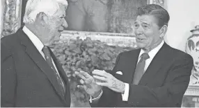  ?? SCOTT STEWART/AP FILE ?? During more mannerly days, this November 1985 photo shows former President Ronald Reagan, right, talking with House Speaker Tip O’neill, D-mass., in the Oval Office of the White House.