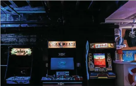  ?? PHOTO PROVIDED ?? Old school arcade games are part of the entertainm­ent at Franklin Alley Social Club, which will open on Friday in downtown Troy.