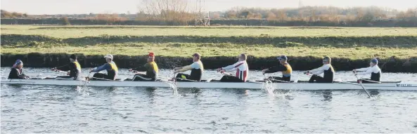  ??  ?? Peterborou­gh City Rowing Club’s winning Masters eight.