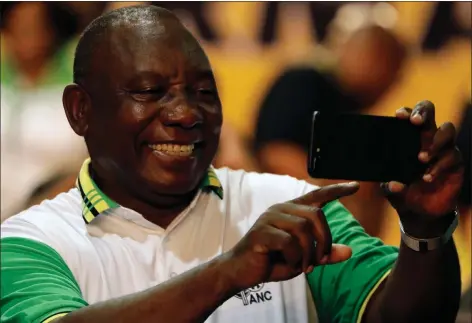  ?? Picture: Themba Hadebe ?? African National Congress President Cyril Ramaphosa takes a selfie after winning the vote to take over from Jacob Zuma.