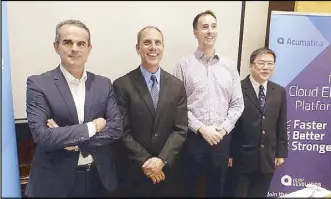  ?? KAP MACEDA AGUILA ?? In town recently for a four-country roadshow of their cloud enterprise resource planning (ERP) platform are (from left): Acumatica president for internatio­nal operations Laurent Dedenis, CEO Jon Roskill with clients Paul Ellis of the RIC Group, and...