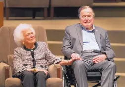  ?? STEVE GONZALES/HOUSTON CHRONICLE ?? Ex-President George H.W. Bush and the late former first lady Barbara Bush attend an awards ceremony in Houston in 2017.