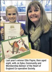  ??  ?? Last year’s winner Ellie Payne, then aged eight, with Jo Dyke, Community and Membership Adviser of the Heart of England Co-operative Society.