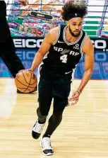  ?? Chris Szagola / Associated Press ?? Derrick White’s fourth NBA season has been marked by its share of sputters and spurts. White had appeared in just 11 of the Spurs’ first 35 games heading into Monday’s contest in Detroit.