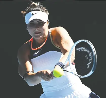  ?? JAIMI JOY/REUTERS ?? Bianca Andreescu keeps here eye on the ball as she returns a shot to Taiwan's Hsieh Su-wei during second-round action on Tuesday at the Australian Open. Andreescu's power game proved ineffectiv­e against Hsieh's defence as the Canadian star bowed out in straight sets.