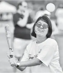  ??  ?? Bianca Lopez bats as more than 110 baseball fans and their family members attend the Saturday event.