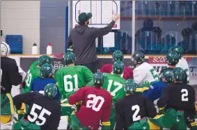  ?? Canadian Press photo ?? Humboldt Broncos head coach Nathan Oystrick goes over drills during a team practice Tuesday.