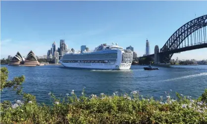  ?? Photograph: James D Morgan/Getty Images ?? The Ruby Princess, which has now been linked to 133 coronaviru­s cases, was allowed to dock in Sydney and passengers disembarke­d with the same instructio­ns given to all those returning from overseas: self-isolate for 14 days.