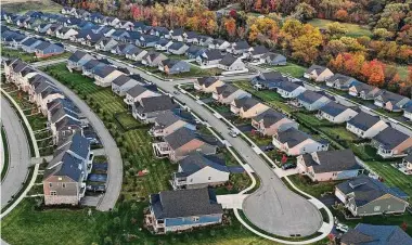  ?? Gene J. Puskar/Associated Press ?? A cul-de-sac runs through a new housing developmen­t in October in Middlesex Township, Pa. The price of natural gas used to heat homes and generate electricit­y is plunging in 2023 thanks to a mild winter in the U.S.