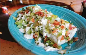 ?? SAMANTHA GRIER / STAFF ?? Fiesta Burrito is a dish served at El Rancho Grande at the Commons at Liberty Falls on Cincinnati-Dayton Road.