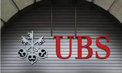  ?? Photograph: Fabrice Coffrini/AFP/Getty Images ?? UBS bought Credit Suisse for the bargain price of 3bn Swiss francs (£2.7bn).