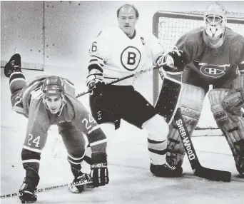  ?? HERALD FILE PHOTO ?? WELL-DESERVED HONOR: Former Bruins captain Rick Middleton (center) will have his No. 16 retired to the Garden rafters in a pregame ceremony Nov. 29.