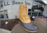  ?? THE ASSOCIATED PRESS ?? Shoppers exit the L.L. Bean retail store in Freeport, Maine.
