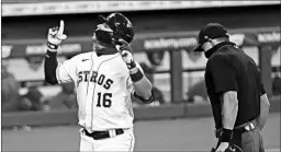  ?? BOB LEVEY/GETTY ?? Aledmys Diaz hit a three-run homer during the first inning of the Astros’ win Thursday.