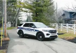  ?? MICHAEL CONROY/AP ?? A police vehicle stands Friday in the vicinity of former Vice President Mike Pence’s Indiana home. The FBI searched the home as part of a classified records probe.