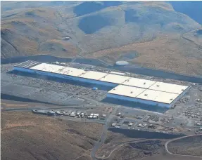  ?? JASON BEAN/USA TODAY NETWORK ?? The Tesla Gigafactor­y in the Tahoe Reno Industrial Center outside Reno, Nev.