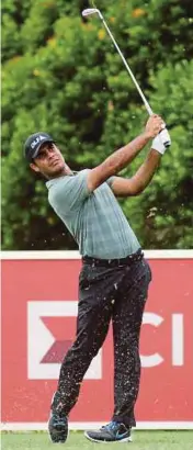  ?? PIC BY EIZAIRI SHAMSUDIN ?? India’s Shubhankar Sharma tees off in the CIMB Classic at TPC Kuala Lumpur yesterday.