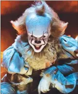  ?? The Associated Press ?? This image released by Warner Bros. Pictures shows Bill Skarsgard as the evil clown Pennywise in a scene from the film It, based on the book by Stephen King.