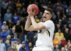  ?? JEFF ROBERSON — THE ASSOCIATED PRESS FILE ?? In this file photo, Missouri’s Michael Porter Jr. pulls down a rebound during the second half in an NCAA college basketball game against Georgia at the Southeaste­rn Conference tournament, in St. Louis. Michael Porter Jr. played in three games in...