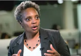  ?? RICH HEIN/ SUN- TIMES ?? Lori Lightfoot, former president of the Chicago Police Board, talks about her decision to run for mayor last week in the Sun- Times newsroom.