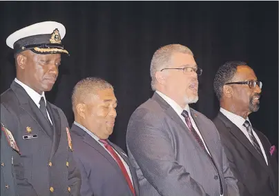  ?? KEVIN ADSHADE/THE NEWS ?? Pictured from left is Canadian navy Lt.-Commander Paul A. Smith, Tony Ince, MLA for Cole Harbour-Portland Valley and Minister of African Nova Scotian Affairs, Doyle Safire of Veteran’s Affairs Canada and Douglas Ruck, son of the late Senator Calvin...