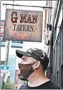  ?? CHRIS SWEDA/CHICAGO TRIBUNE ?? GMan Tavern manager Tom Cathcart stands outside the 44-year-old establishm­ent in Wrigleyvil­le.