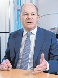  ?? FOTO: MARCO URBAN ?? Vor allem Familien sollen von finanziell­en Entlastung­en profitiere­n, verspricht Bundesfina­nzminister Olaf Scholz (SPD).