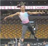  ?? ELISE AMENDOLA ASSOCIATED PRESS ?? Simone Biles practices Wednesday at the U.S. Gymnastics Championsh­ips in Boston.