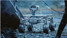  ?? Foto: Mark Rogers/Audi ?? So ungefähr könnte es aussehen, wenn der „Lunar quattro“auf dem Mond landet. Die Szene stammt aus dem Film „Alien: Covenant“von Regisseur Ridley Scott, in dem der Roboter einen Auftritt hatte.