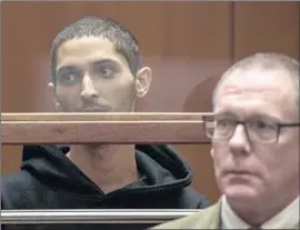  ?? Irfan Khan Los Angeles Times ?? TYLER BARRISS, left, shown at a Jan. 3 court appearance, is suspected of making a false emergency call that led to a police shooting of a man in Kansas.