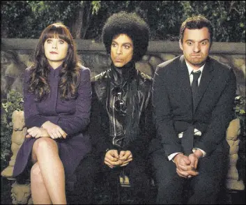  ?? Fox ?? Prince, flanked by Zooey Deschanel and Jake Johnson, in a 2014 episode of “New Girl.”