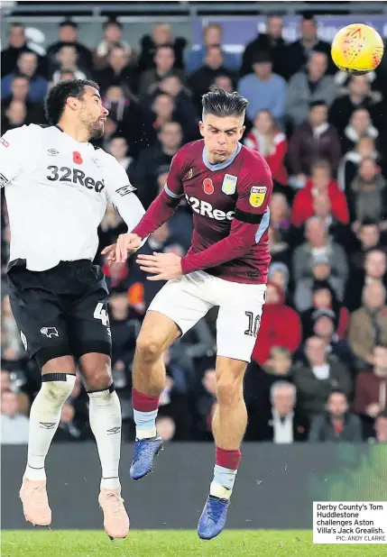  ?? PIC: ANDY CLARKE ?? Derby County’s Tom Huddleston­e challenges Aston Villa’s Jack Grealish.