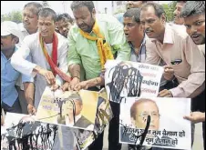  ?? PTI FILE ?? BJP supporters carry out a protest against senior SP leader and former UP minister Azam Khan.