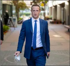  ?? JASON HENRY — THE NEW YORK TIMES ?? Mark Zuckerberg, Meta’s chief executive, leaves the federal courthouse in San Jose, Calif., on Tuesday. Zuckerberg made a rare court appearance as the Federal Trade Commission tries to block his company’s $400 million deal for the virtual reality startup Within.