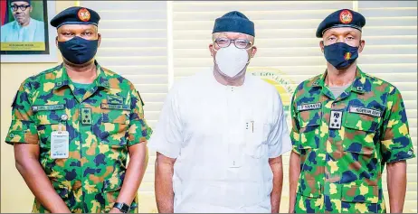  ??  ?? Outgoing Commander, 32 Artillery Brigade, Nigerian Army ( covering Ekiti and Ondo states), Brig. Gen. RT Usaha ( left); Governor of Ekiti State, Kayode Fayemi and the incoming Commander, Brig. Gen. Yakubu Yahaya, during a visit to Fayemi in Ado- Ekiti… yesterday.