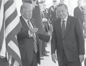  ?? SAUL LOEB, AFP/ GETTY IMAGES ?? President Trump welcomes Turkish President Recep Tayyip Erdogan to the White House on Tuesday. Erdogan objects to Trump’s decision to arm a Kurdish militia to fight the Islamic State.