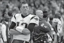  ?? MARK ZALESKI/AP PHOTO ?? In this Nov. 11 file photo, New England Patriots quarterbac­k Tom Brady watches from the sideline after leaving the game in the second half of the Patriots’ 34-10 loss to the Tennessee Titans at Nashville.