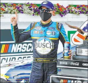  ?? Matt Slocum The Associated Press ?? Kevin Harvick, celebratin­g his 2020 triumph at Pocono Raceway, hopes returning to the track in Long Pond, Pa., gets him back to winning form.