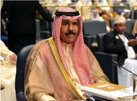  ?? (AP Photo/nasser Waggi/file) ?? Kuwait’s then-crown Prince Sheikh Nawaf Al Ahmad Al Sabah attends the closing session of the 25th Arab Summit on March 26, 2014, in Bayan Palace in Kuwait City. Kuwait’s ruling emir, the 86-year-old Sheikh Nawaf, has died, state television reported Saturday.